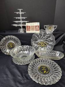 lot 556 image: Glassware, Moundridge Creamery Plates, and More