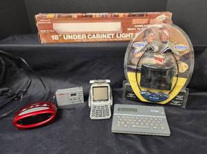 lot 578 image: NIB 18 Under Cabinet Light Fixture, Timex Alarm Clock, TV Ears, and More