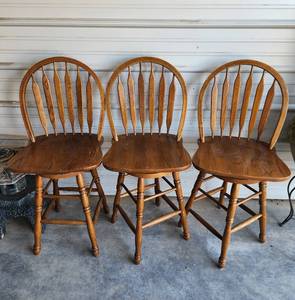 lot 10 image: (3) A-America Solid Oak Swivel Barstools