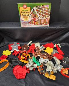 lot 727 image: Vintage Cookie Cutters and Gingerbread House Kit