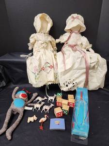 lot 730 image: Pillowcase Dolls, Sock Monkey, Wooden Blocks, and More