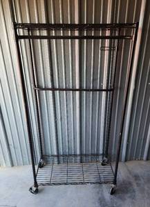 lot 767 image: Metal Clothing Rack on Wheels 35x18x66