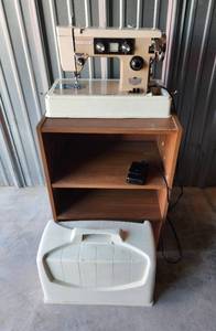 lot 769 image: Dressmaker Deluxe Zig Zag Sewing Machine in Case Model SWM1000 with Stand