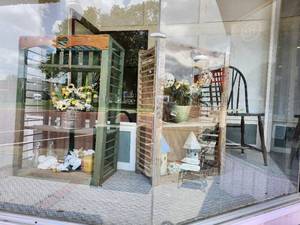 lot 44564 image: Contents Of Window Display, Including Wood Chair, Coke Co2