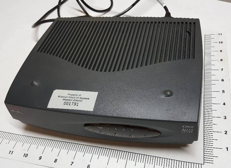 lot 5672 image: Cisco Micro Switch model 10100 from a working office