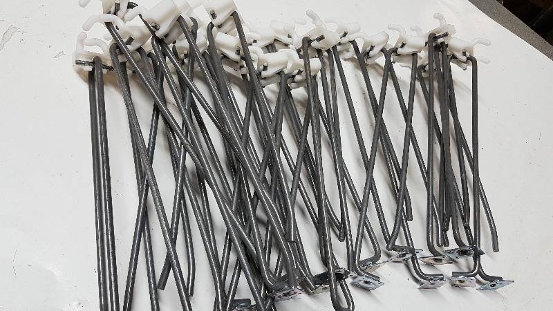 lot 5474 image: Big assortment of 14 peg board hooks for your retail store or shop at home