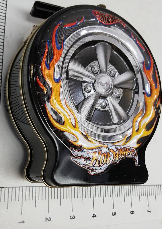 lot 5438 image: The candy Hot Wheels coins are gone but the carrying case is perfect