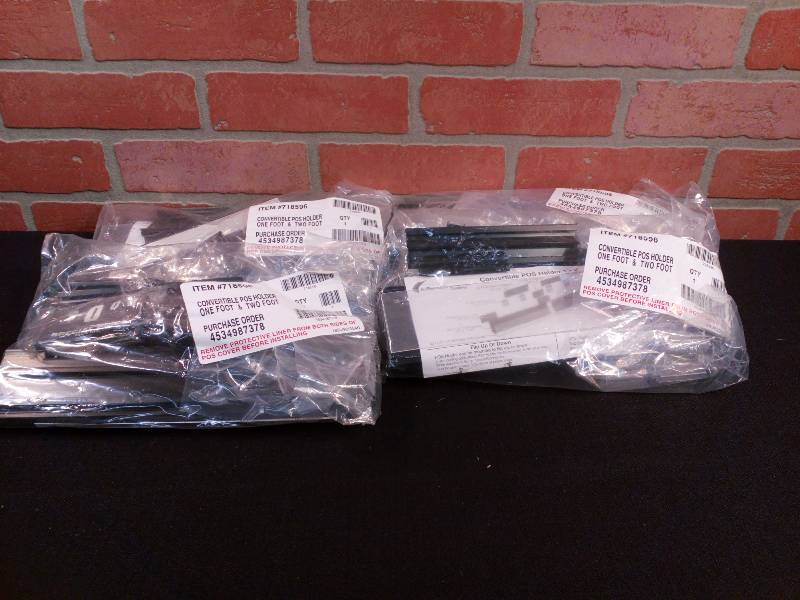 lot 103 image: Convertible POS Holder One Foot & Two Foot