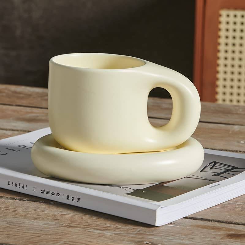 lot 13675 image: Koythin Ceramic Coffee Chubby Mug Saucer Set, Creative Cute Fat Handle Cup with Saucer for Office and Home, Dishwasher and Microwave Safe, 10 oz for Latte Tea Milk (Milky Apricot)