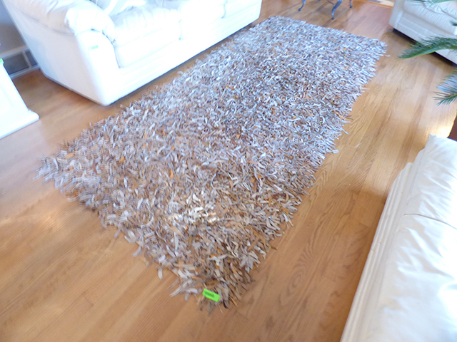 lot 1012 image: Leather Decorator Rug 120 long x 52 wide