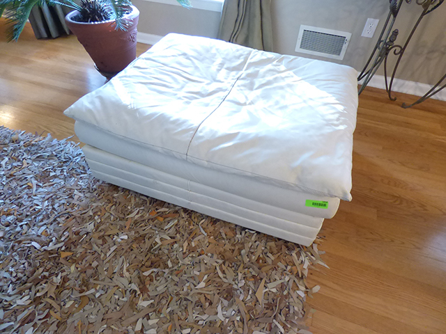 lot 1014 image: White Leather Ottoman 38 x32