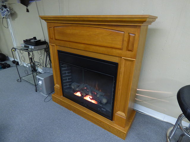 lot 1060 image: Electric Oak Fireplace 52 x 16 x 51 high with BlowerFire Controls