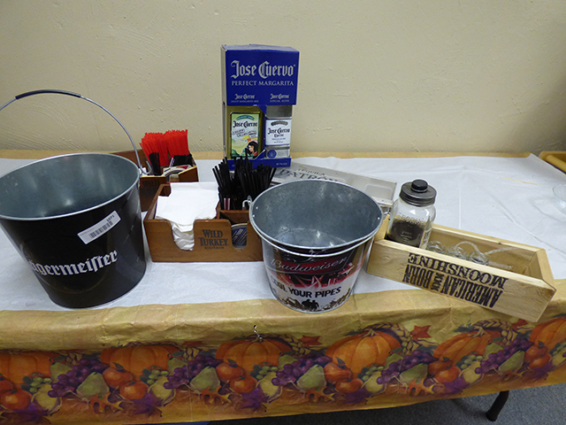 lot 1071 image: Jagermeister Bucket, Bud Bucket, Wild Turkey with Straws and Patron Setup