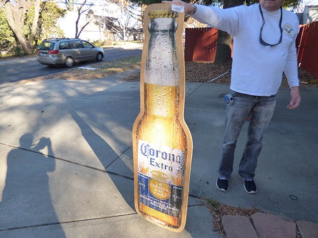 lot 1104 image: Corona Bottle on Wood with Great Patina 60 x 17 wide