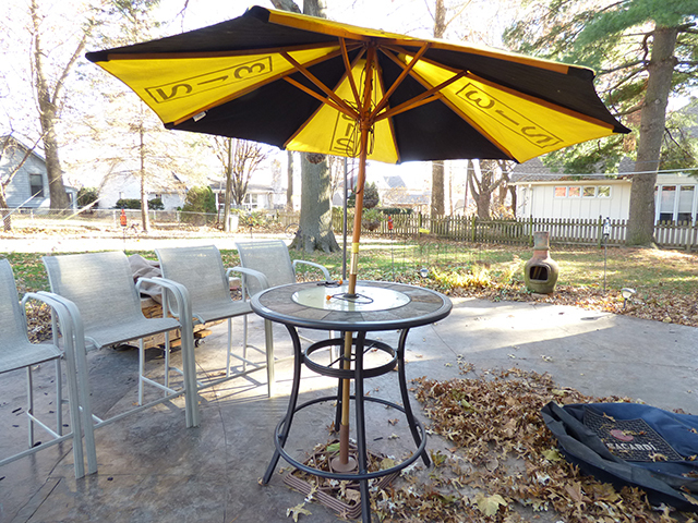 lot 1109 image: 40 Round Pub Tile Table with Glass and Metal Black Base with Umbrella
