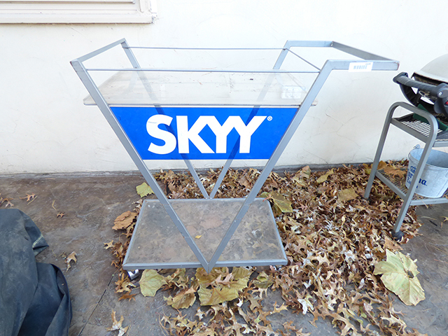 lot 1110 image: Skyy Patio Serving Cart on Casters with Acrylic Button on the Top Shelf with Handle