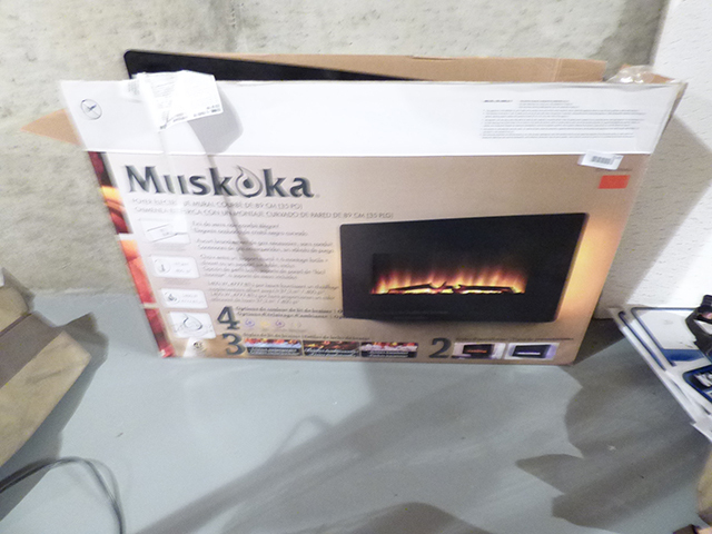 lot 1120 image: New Muskok Electric Fireplace with Remote wall mount or stand.