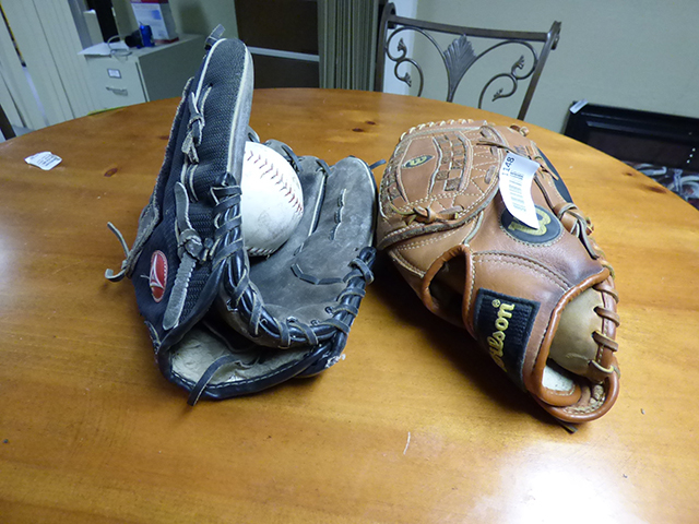 lot 1148 image: 2 Leather Wilson Baseball Gloves with Softball and baseball
