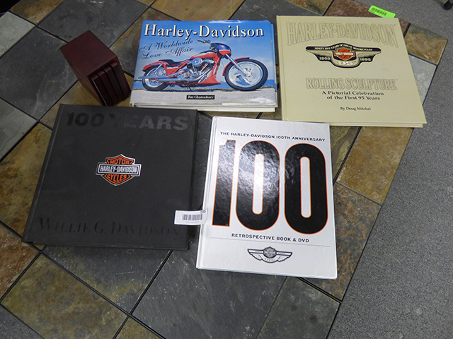 lot 1165 image: 4 Special Ediiton Harley Books with coasters