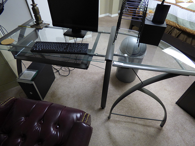 lot 1176 image: Glass Desk 65 long x 26 deep x 30 high with Slide out Keyboard Drawer