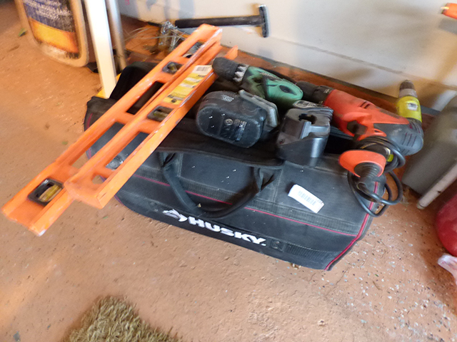 lot 1201 image: Husky Tool Bag with Levels Power Drill with Hi Tech Drill with Charger   Tapes etc..
