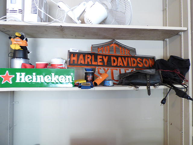 lot 1300 image: Harley Davidson Stainless Sign with Heineken Sign, Harley Leather Tool Bag, Koozies, 2 Thermos Bottles, 2 Folding Chairs, and Electric Halagen Handheld Custom Light with bag