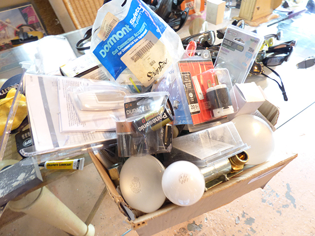 lot 1314 image: Box of Misc. LightsBatteriesPlugsGas Connection, Accessories and Lots of Good Stuff, (Approximately $200 plus in Box)