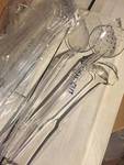 New case of eight serving spoons and for ladles