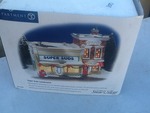 Collectible  snow village ceramic light up town pieces as pictured