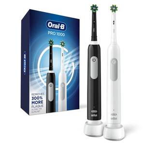 lot 54619 image: Oral-B Pro 1000 CrossAction Electric Toothbrush, Black and White, 2 Count - Retail $87.04