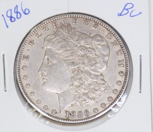 lot 4233 image: 1886 BU Morgan Silver Dollar