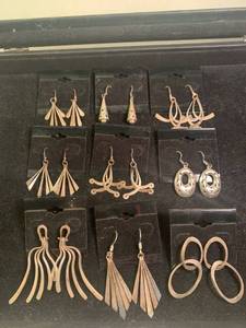 lot 32 image: Nine Pairs of Sterling Earrings