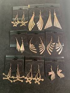 lot 34 image: Nine Pairs of Sterling Earrings