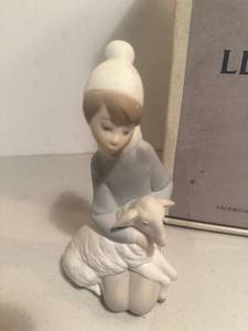 lot 170 image: Lladro porcelain boy with goat wrong box
