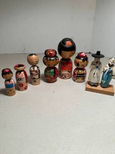 lot 173 image: Lot of 7 wooden KokeshiJapanese carved figurines