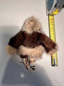 lot 318 image: Vintage Inuit cloth, caribou, leather doll