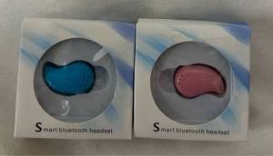 lot 3447 image: Set of 2 Smart Bluetooth Headset Pink and Blue