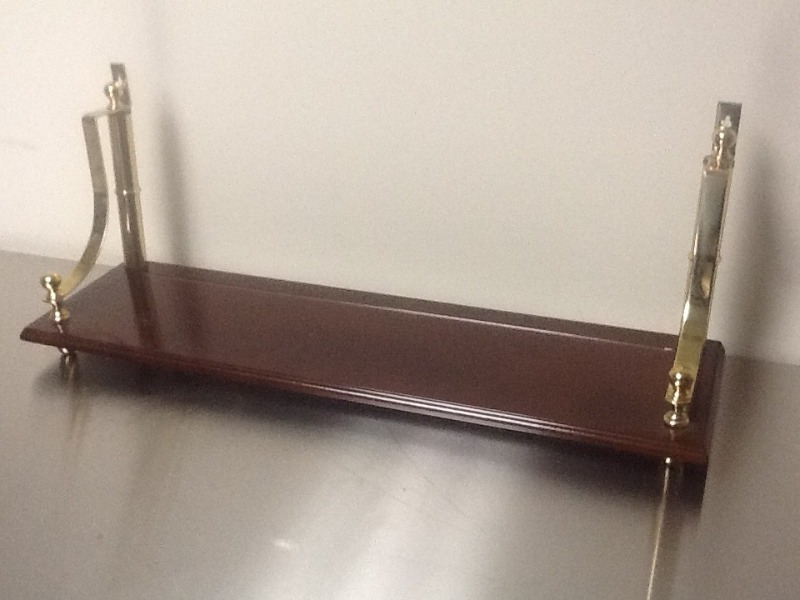 lot 217 image: Nice wood shelf with brass accents set on counter  or hanging from wall
