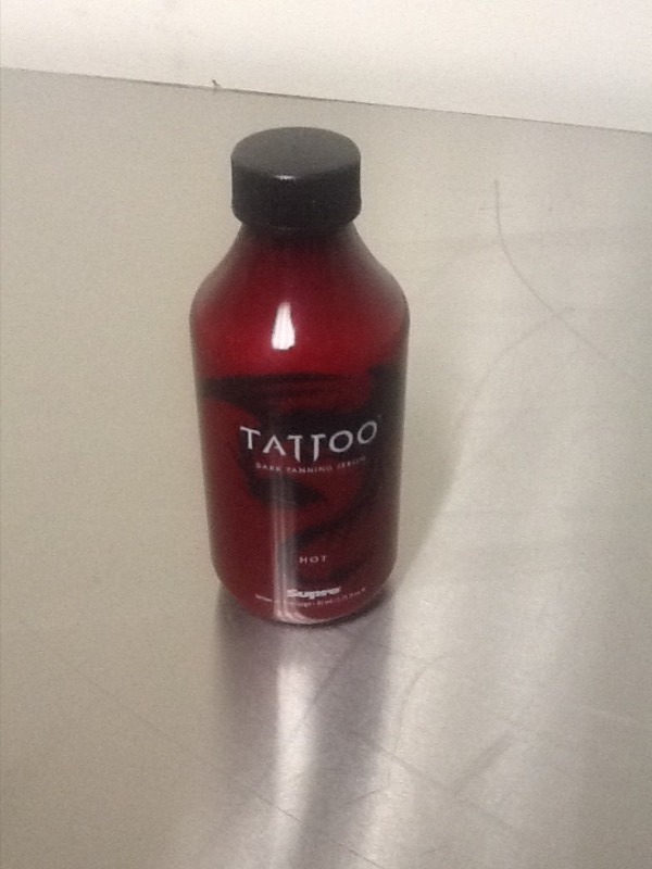 lot 227 image: 23 bottles of  tanning bed lotion