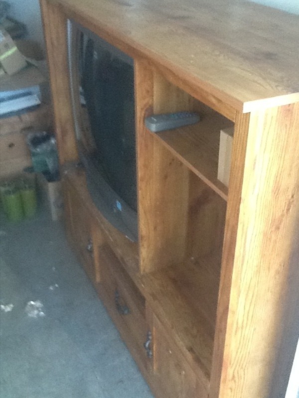 lot 60 image: TV cabinet with TV and remote  came out working daycare