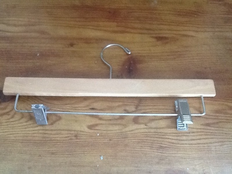 lot 69 image: Case of 30 wooden pant hangers