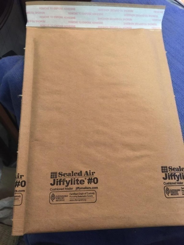 lot 716 image: Case of 50 jiffy light bubble self seal shipp...