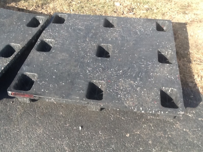 lot 243 image: Nice poly skid  great for storing stuff in your basement or anywhere you need up off the floor will never write 4 x 4 poly skid