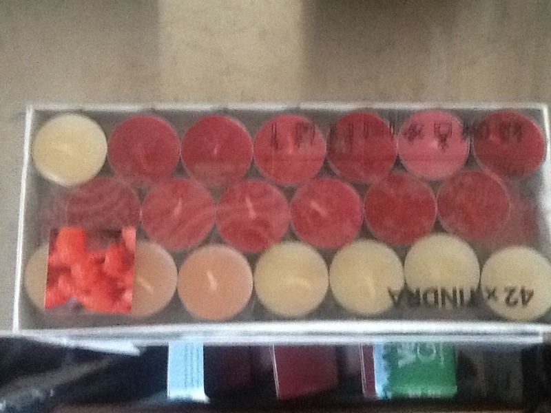 lot 285 image: Box of 42 scented tea candles great for the holiday season