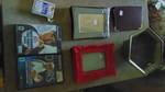lot of picture frames and PlayStation games