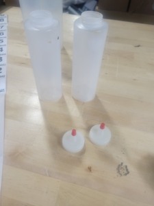lot 3626441 image: Small Plastic Sauce Bottle with Lid 2 Pack, Lids May Very