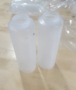 lot 3626443 image: Small 7in Plastic Sauce Bottle with Lid 2 Pack
