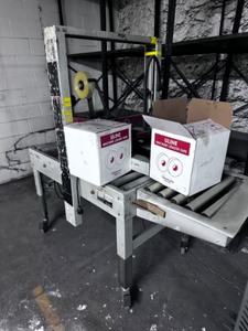 lot 3625462 image: Signode Tape Packaging Machine w box of ULine tape