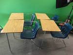 4 students desks w/chairs.
