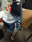 Stack of 5 small child chairs.